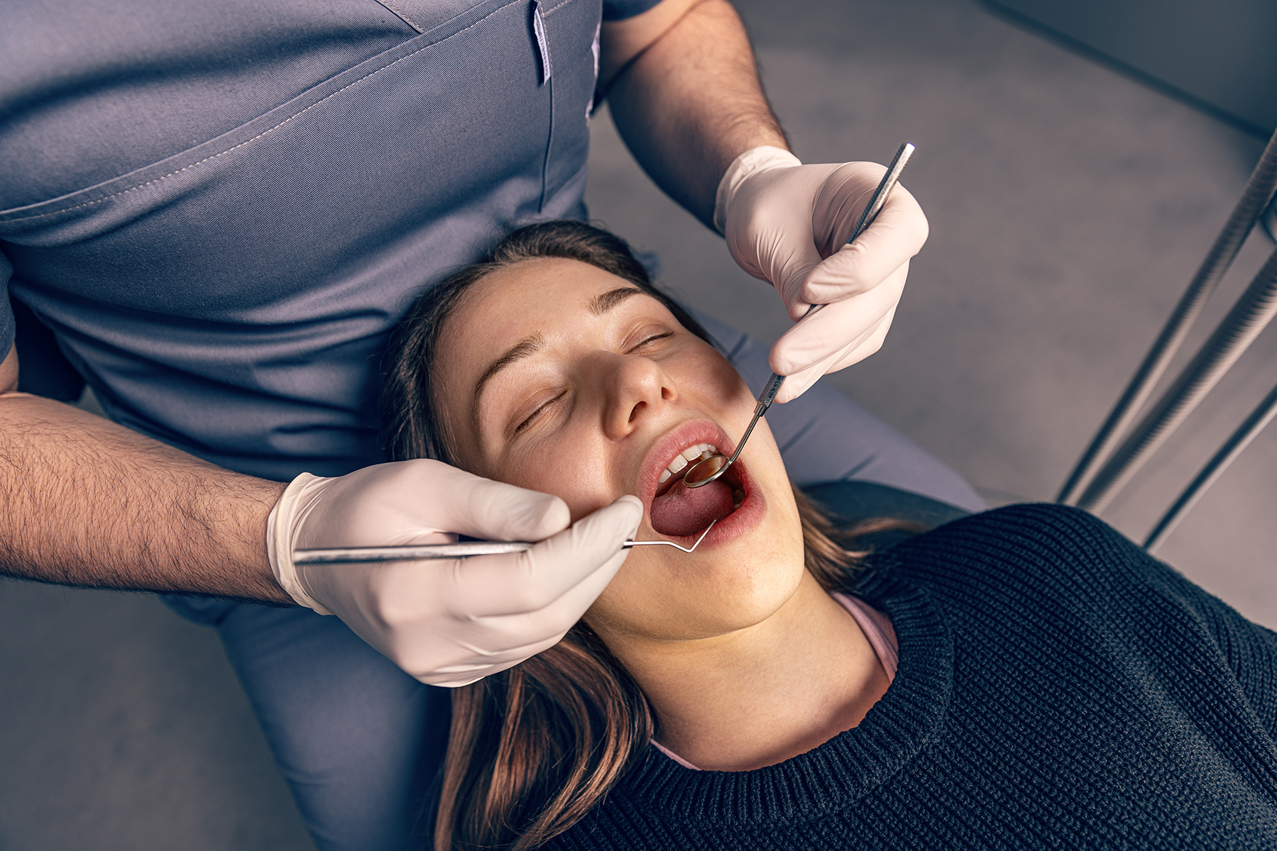 Woman getting an oral exam in Vero Beach, FL